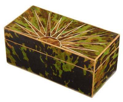 Appraisal: A faux tortoiseshell box the hinged cover inlaid a sunburst