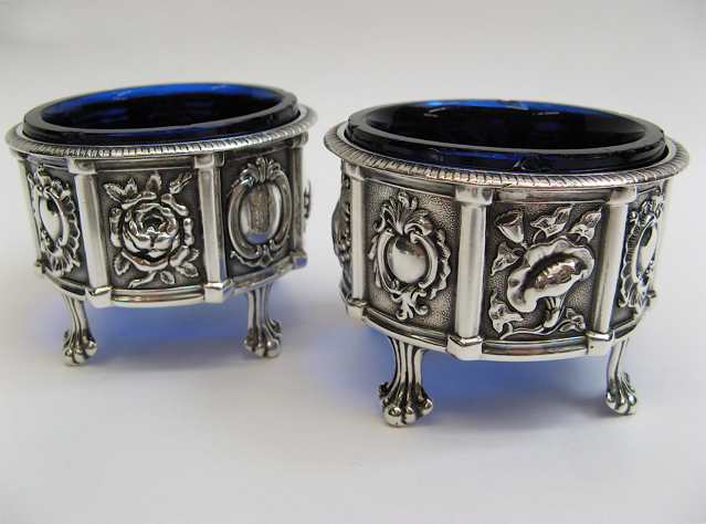 Appraisal: PAIR AMERICAN STERLING SILVER SALT CELLARS c decorated with alternating