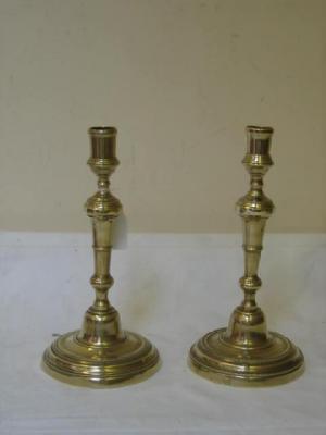 Appraisal: A PAIR OF GEORGIAN SEAMED CANDLESTICKS of tapering form with