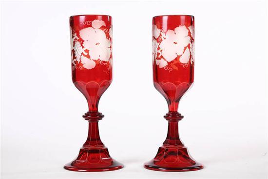 Appraisal: PAIR OF BOHEMIAN VASES Ruby cut to clear of leaf