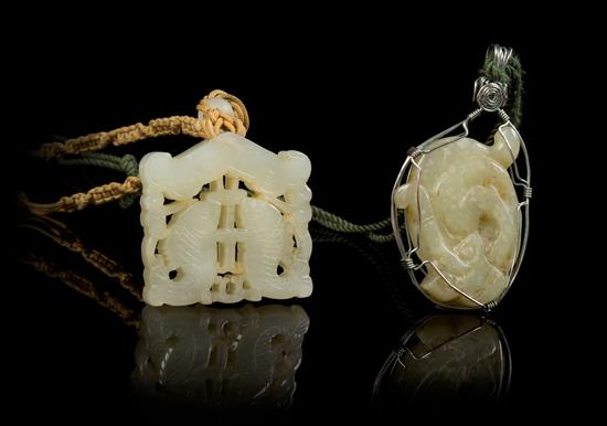 Appraisal: Sale Lot Two Carved Jade Pendants each stone of a