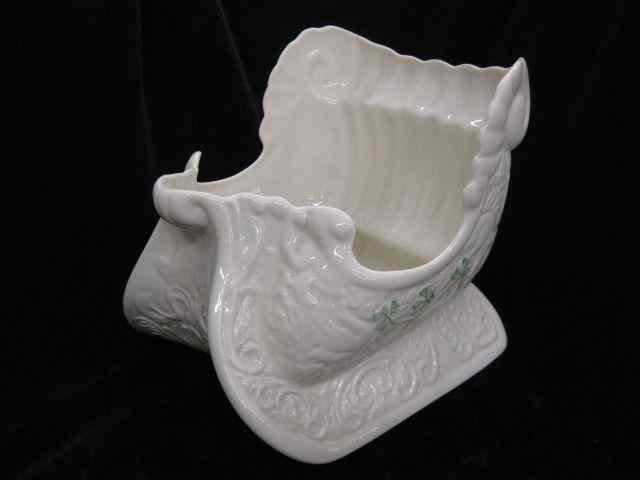 Appraisal: Irish Belleek Porcelain Planter sleigh with clover trim