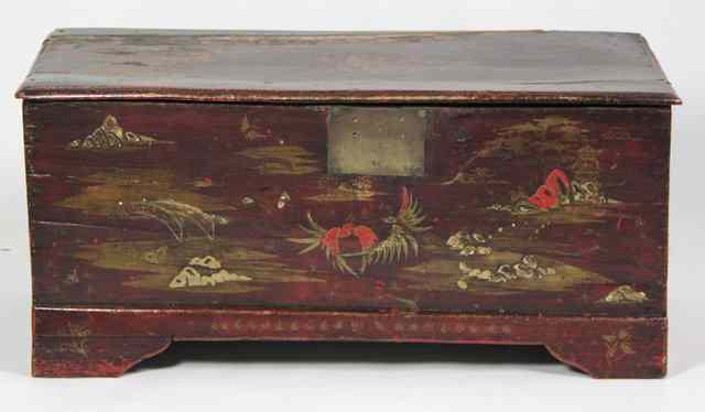 Appraisal: A Chinese incised and painted chest cm wide