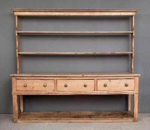 Appraisal: A th Century stripped pine dresser the upper part with