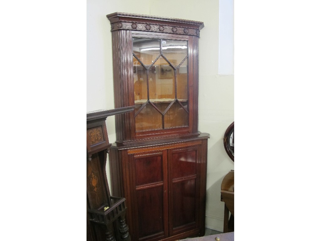 Appraisal: Georgian mahogany corner cabinet on stand