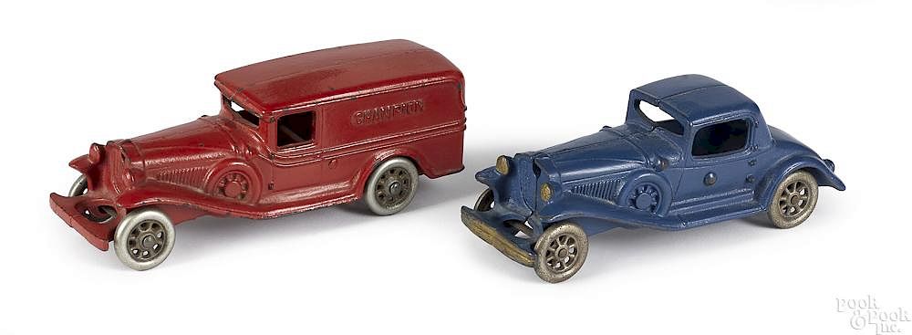 Appraisal: Two Champion cast iron vehicles Two Champion cast iron vehicles