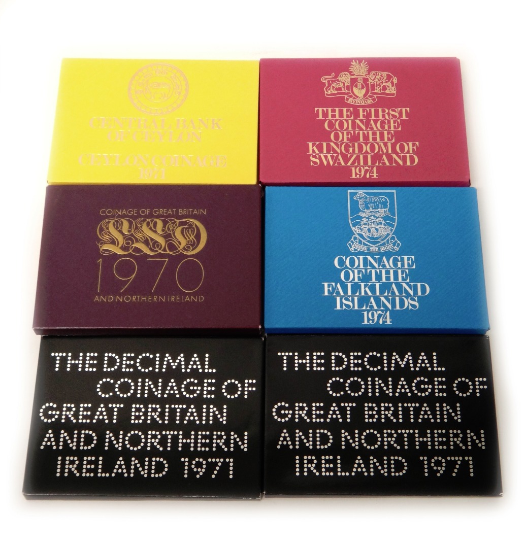 Appraisal: Four Great Britain year type proof specimen coin sets comprising