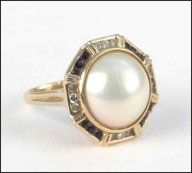 Appraisal: KARAT YELLOW GOLD MABE PEARL DIAMOND AND SAPPHIRE RING grams