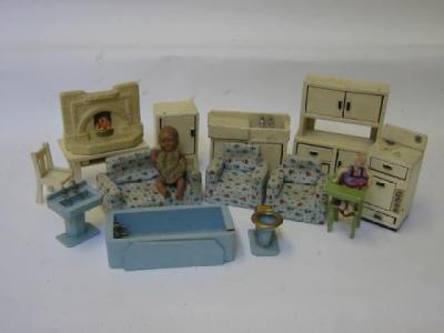 Appraisal: A wooden six piece doll's house kitchen set including cooker