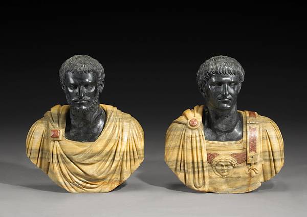 Appraisal: A pair of onyx and cast stone busts of Roman