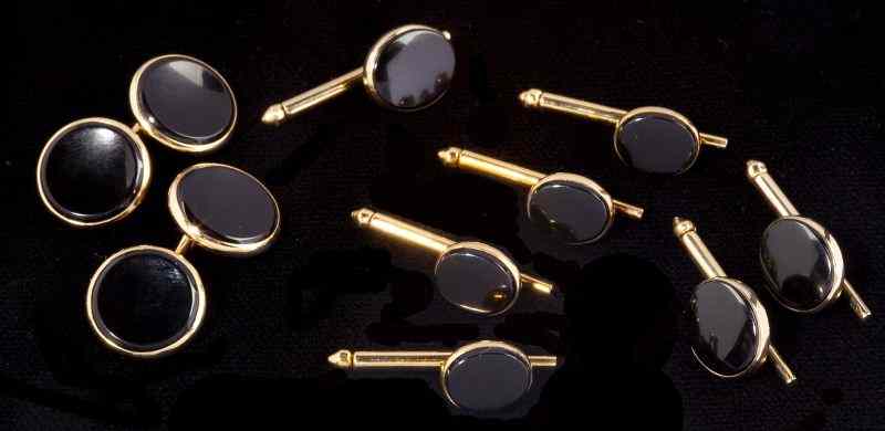 Appraisal: Assembled Gold and Onyx Dress Setincluding a pair of cufflinks