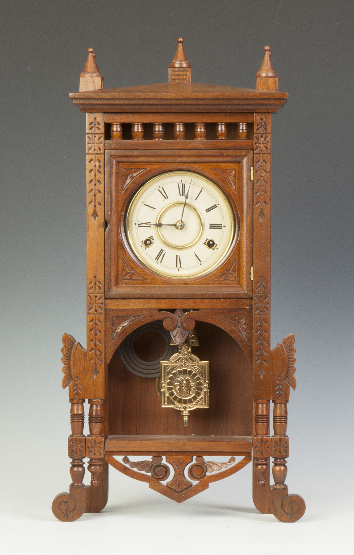 Appraisal: New Haven Clock Co Adige C Carved walnut case Old