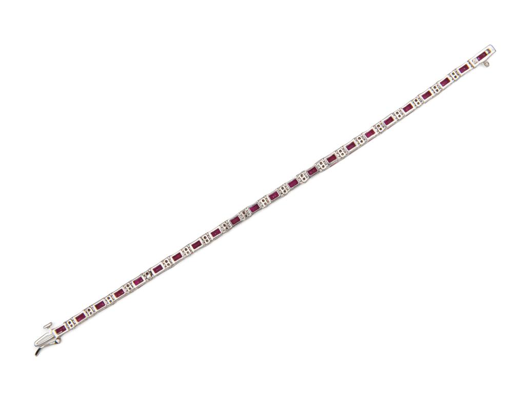 Appraisal: K Gold Ruby and Diamond Line Bracelet comprising step-cut rubies