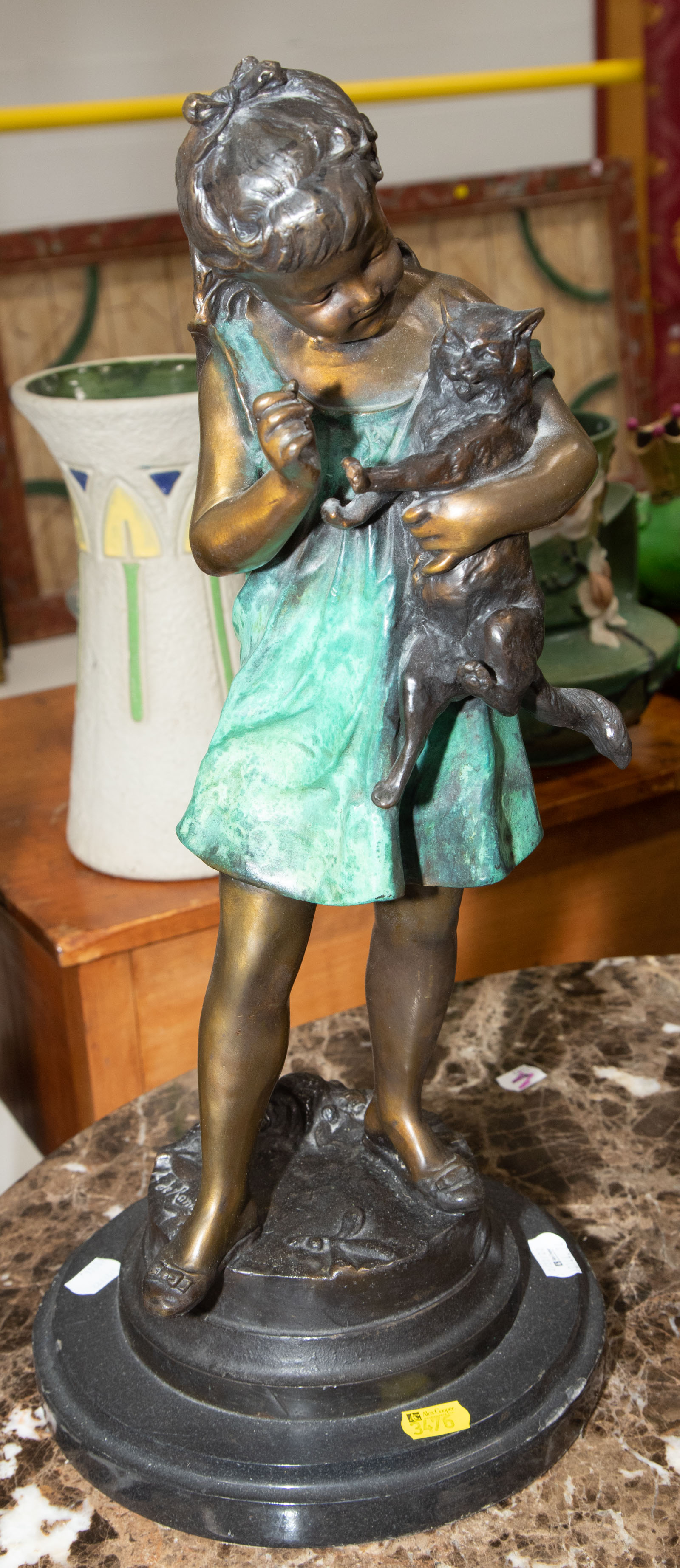 Appraisal: REPRODUCTION BRONZE FIGURE OF A GIRL WITH CAT Signed A