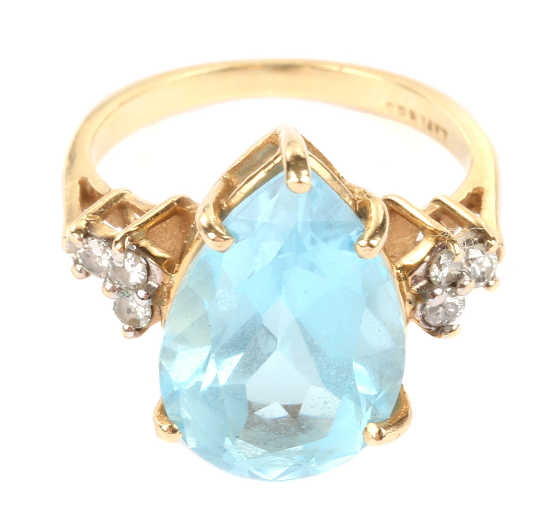 Appraisal: An Aquamarine and Diamond Ring K pear shaped aquamarine approximately