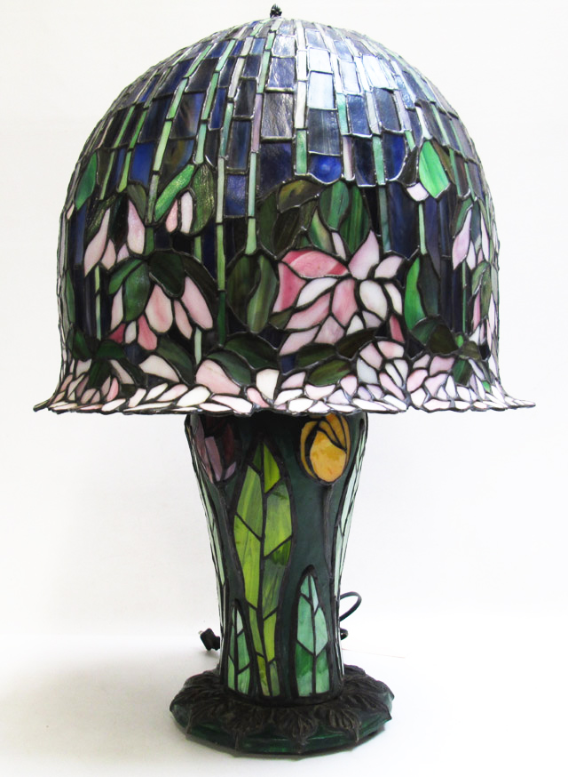 Appraisal: STAINED AND LEADED GLASS TABLE LAMP in floral patterns the