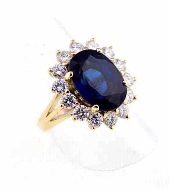 Appraisal: Natural blue sapphire and diamond ring ct sapphire surrounded by