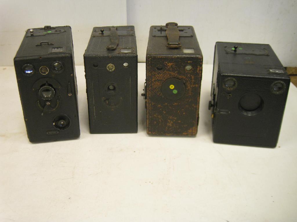 Appraisal: Two black case press type Plate Cameras both with carry