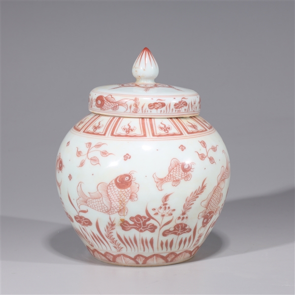 Appraisal: Chinese porcelain covered jar with fish design and four-character mark