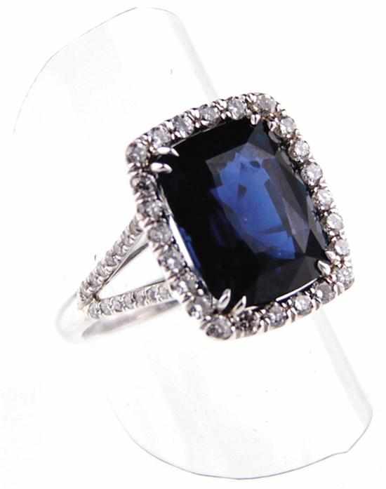 Appraisal: Vivid blue sapphire and diamond ring cushion-cut blue sapphire ct