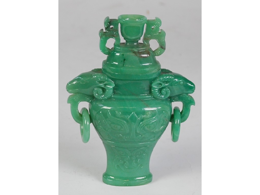 Appraisal: CHINESE CARVED GREEN JADE TWO HANDLED VASE and cover flattened