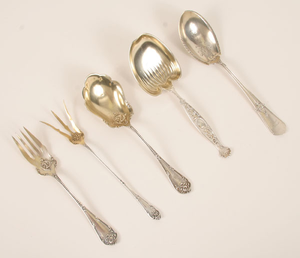 Appraisal: Five American sterling silver serving pieces with a gold wash