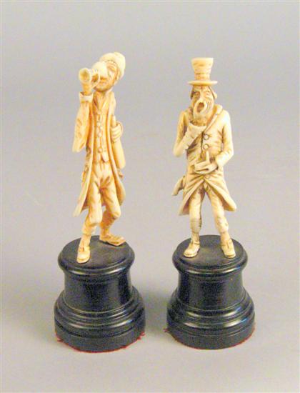 Appraisal: Two amusing German carved ivory figures th century The first