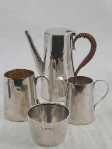 Appraisal: A silver cafe au lait pot and cream jug Birmingham