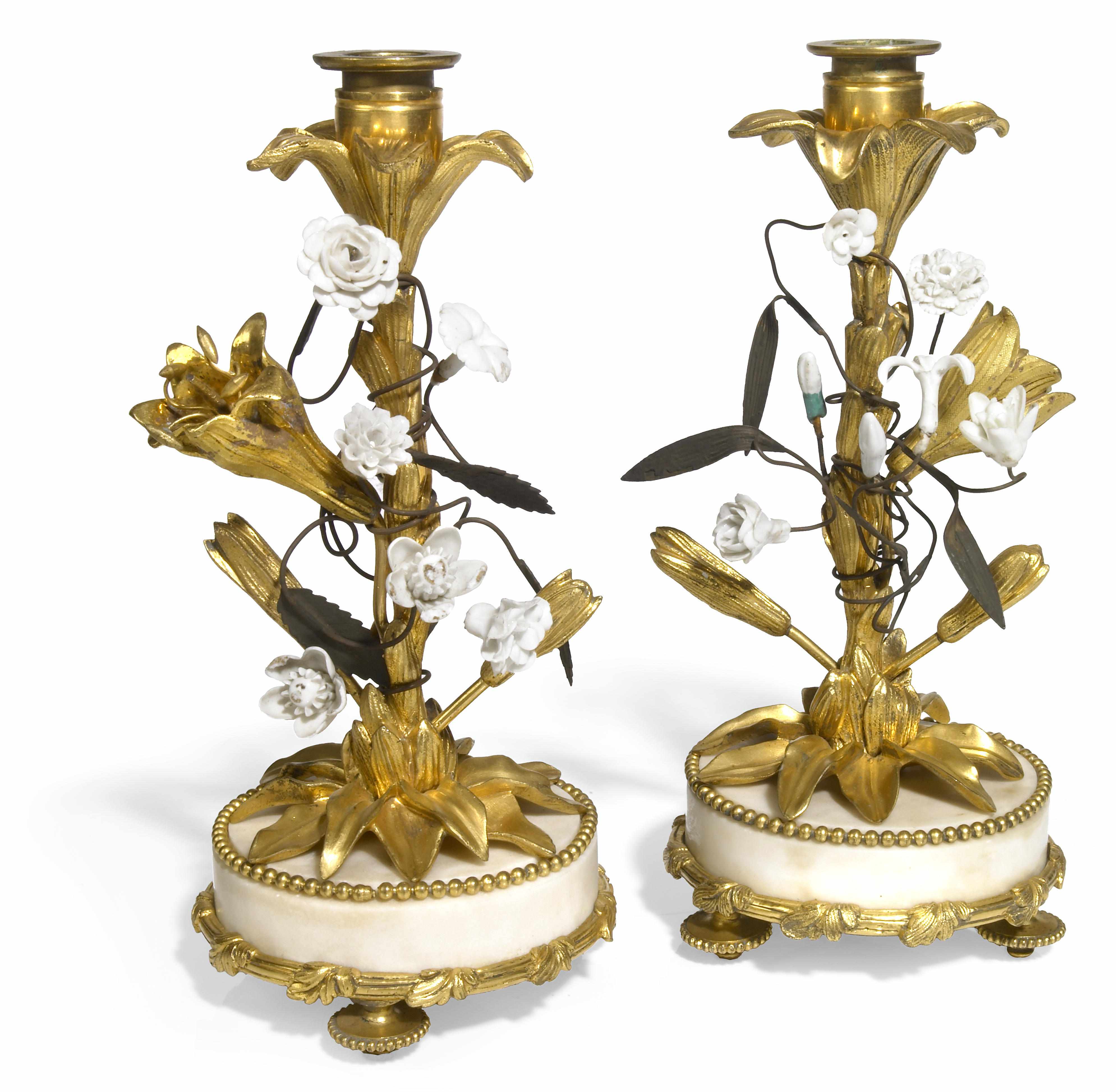 Appraisal: A pair of Louis XVI gilt bronze porcelain mounted and