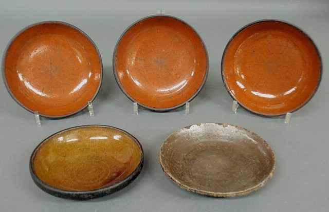 Appraisal: Five Pennsylvania redware pie plates th c each approx dia