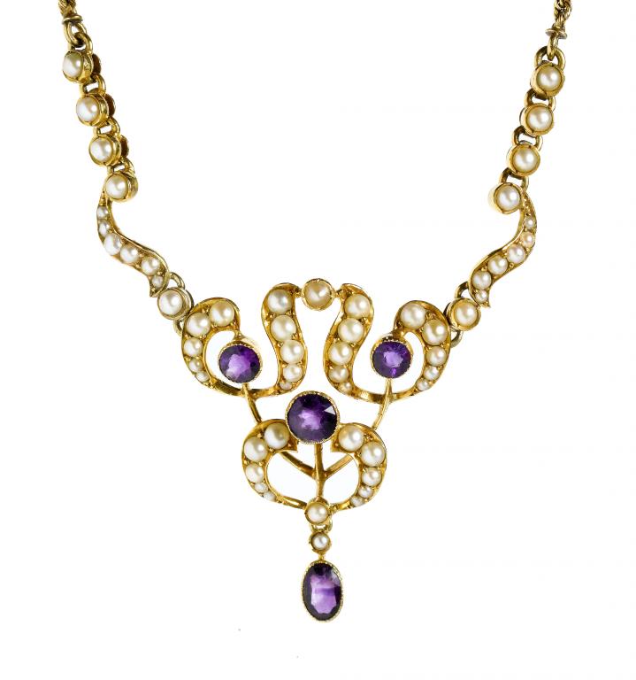 Appraisal: A VICTORIAN AMETHYST AND SEED PEARL PENDANT on integral gold