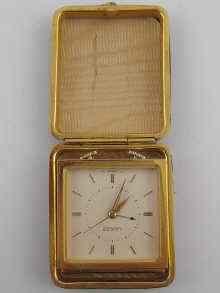 Appraisal: A travelling clock by Luxor dial approx cm square