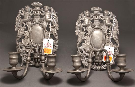 Appraisal: Pair of Continental Baroque style pewter sconces th century in