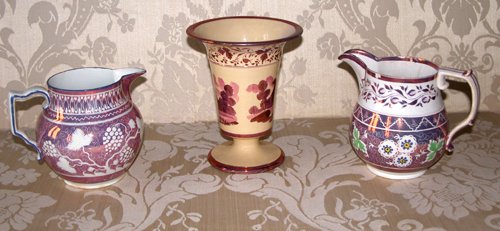 Appraisal: Title pink lustre pitchers one with grape motif and copper