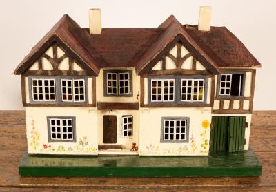 Appraisal: A s dolls house with twin gable roof and opening