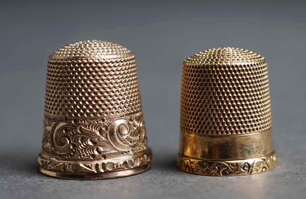 Appraisal: -KARAT YELLOW-GOLD THIMBLE AND A GOLD-FILLED THIMBLE K DWT -Karat