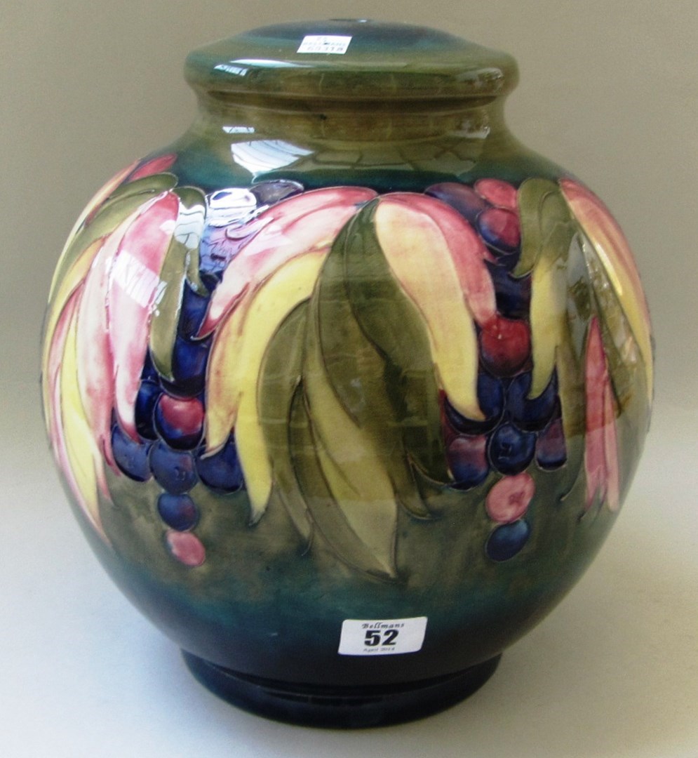 Appraisal: A Moorcroft table lamp base decorated in the leaf grape