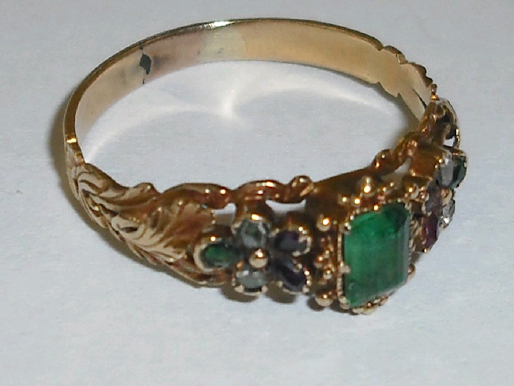 Appraisal: Attractive Georgian gold cluster ring with a centre emerald in