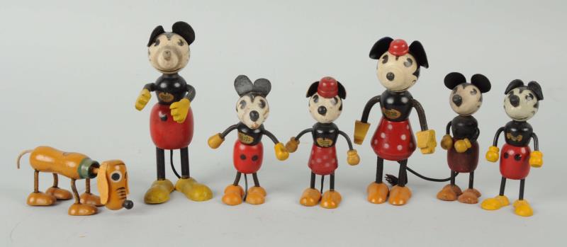 Appraisal: Lot Of Walt Disney Mickey Minnie Figures The two Minnie