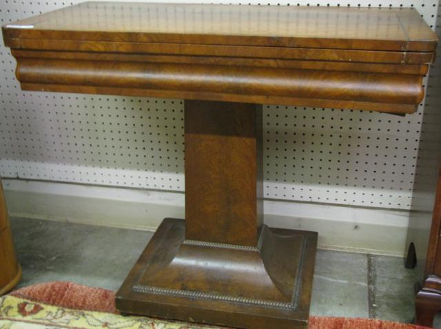 Appraisal: th century Empire style mahogany tilt-top game table with crotch