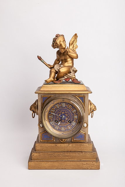 Appraisal: A CONTINENTAL GILT MANTEL CLOCK of square cut form with