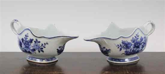 Appraisal: A pair of Chinese blue and white silver shaped sauce