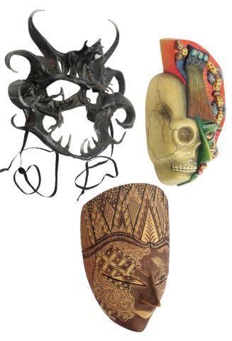 Appraisal: lot of Mixed media masks including painted leather mask dated