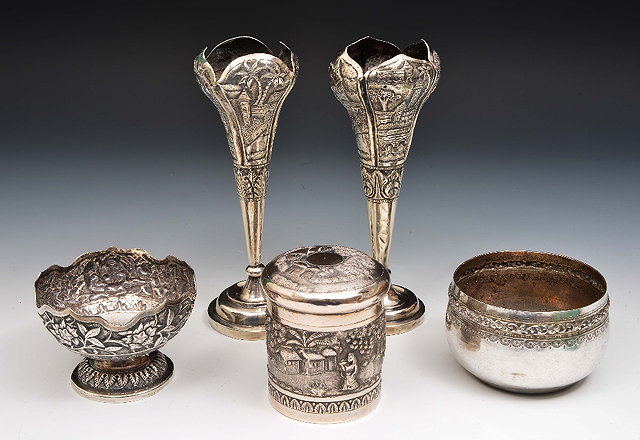 Appraisal: A pair of Burmese silver posy vaseslate th Century cm