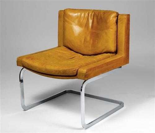 Appraisal: CHAIR Switzerland circa Tobacco leather and chrome base