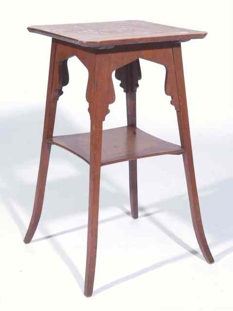 Appraisal: AN ART NOUVEAU OAK SQUARE TOP OCCASIONAL TABLE with swept