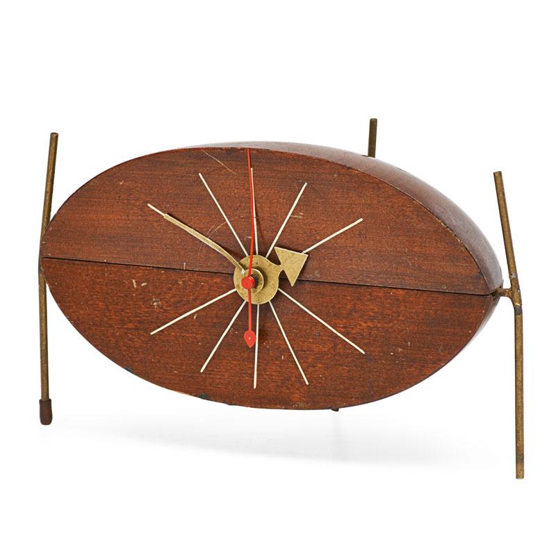 Appraisal: GEORGE NELSON Watermelon table clock Condition Report Darkened dents and