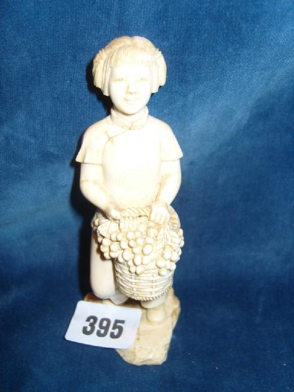 Appraisal: An early th century Japanese ivory figure of a young