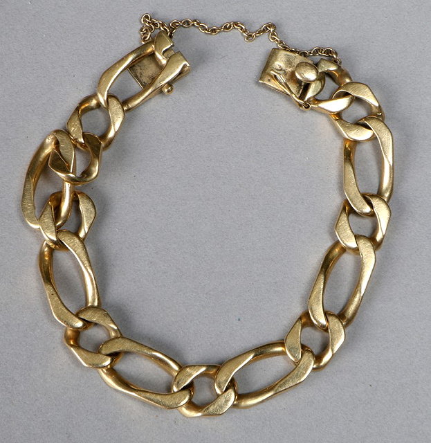 Appraisal: AN CT GOLD CURB LINK BRACELET with box catch import