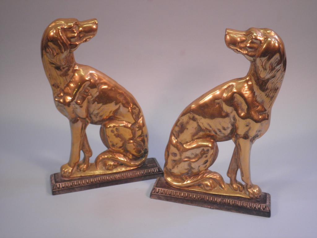 Appraisal: A pair of thC brass and cast iron door stops